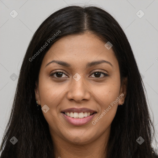 Joyful latino young-adult female with long  brown hair and brown eyes