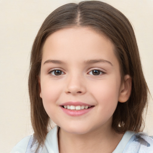 Joyful white child female with medium  brown hair and brown eyes