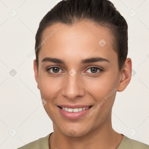 Joyful white young-adult female with short  brown hair and brown eyes