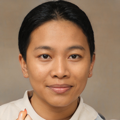 Joyful asian young-adult female with short  black hair and brown eyes