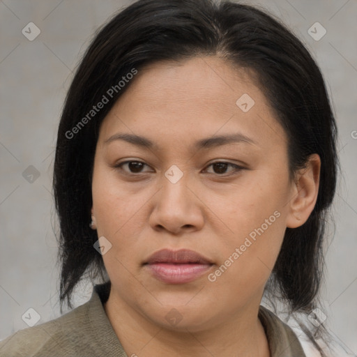 Joyful asian young-adult female with medium  brown hair and brown eyes