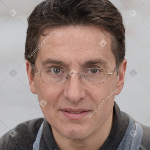 Joyful white adult male with short  brown hair and grey eyes