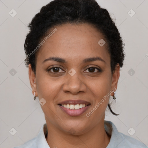 Joyful latino young-adult female with short  brown hair and brown eyes