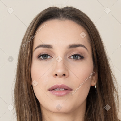 Neutral white young-adult female with long  brown hair and brown eyes