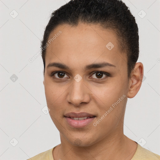 Joyful latino young-adult female with short  brown hair and brown eyes