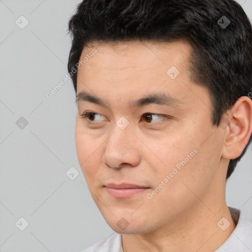 Neutral asian young-adult male with short  black hair and brown eyes