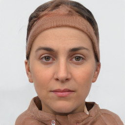 Neutral white young-adult female with short  brown hair and brown eyes