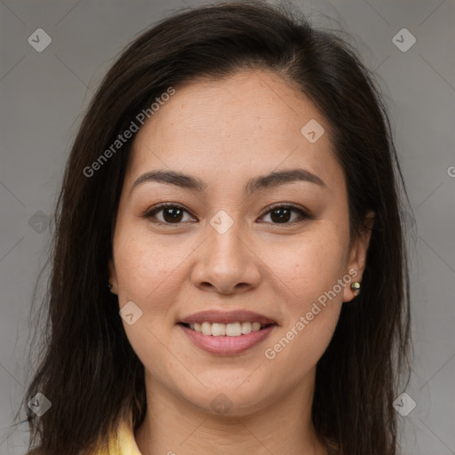 Joyful latino young-adult female with long  brown hair and brown eyes