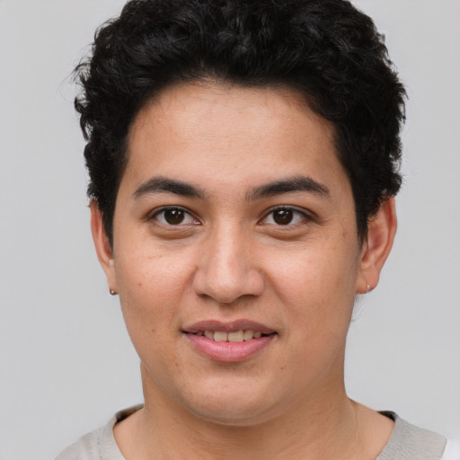 Joyful asian young-adult female with short  brown hair and brown eyes