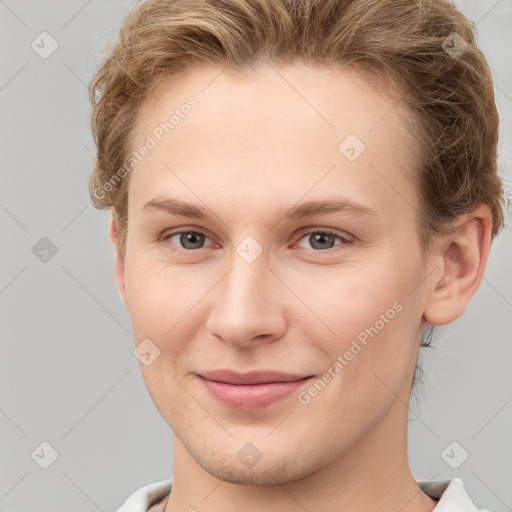 Joyful white young-adult female with short  brown hair and grey eyes