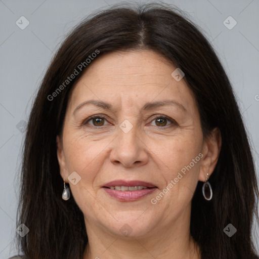 Joyful white adult female with long  brown hair and brown eyes