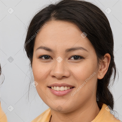 Joyful asian young-adult female with medium  brown hair and brown eyes