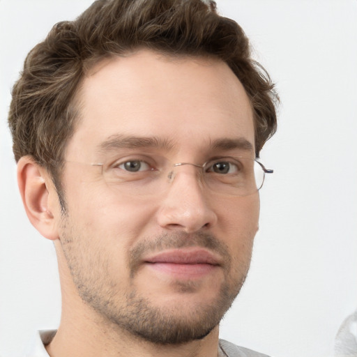 Neutral white young-adult male with short  brown hair and grey eyes