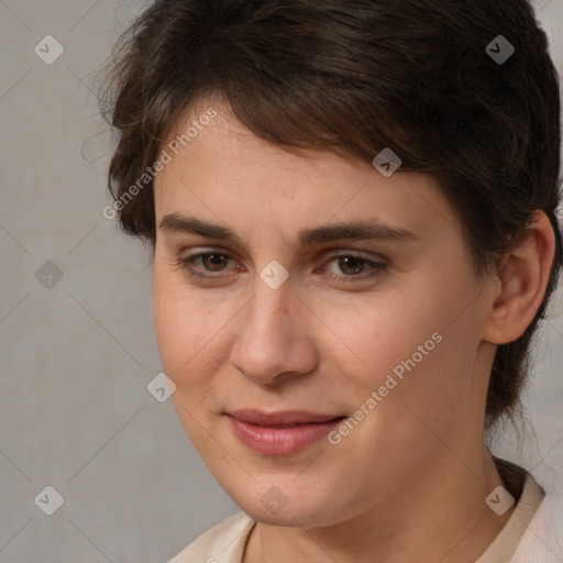 Joyful white young-adult female with medium  brown hair and brown eyes