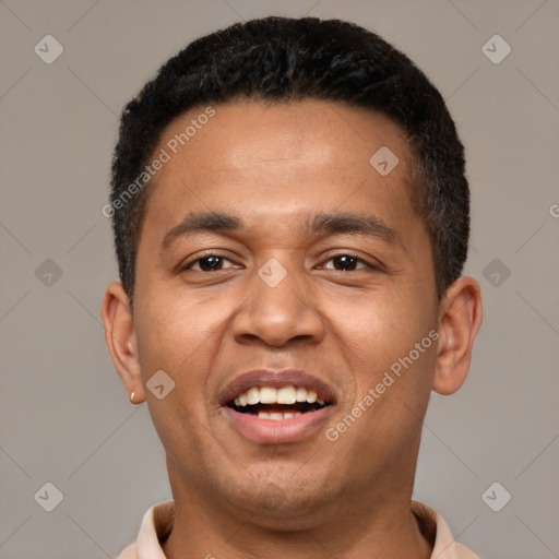 Joyful white young-adult male with short  black hair and brown eyes