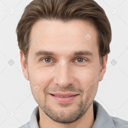 Joyful white adult male with short  brown hair and brown eyes