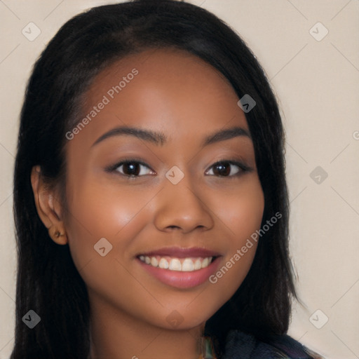 Joyful latino young-adult female with long  black hair and brown eyes