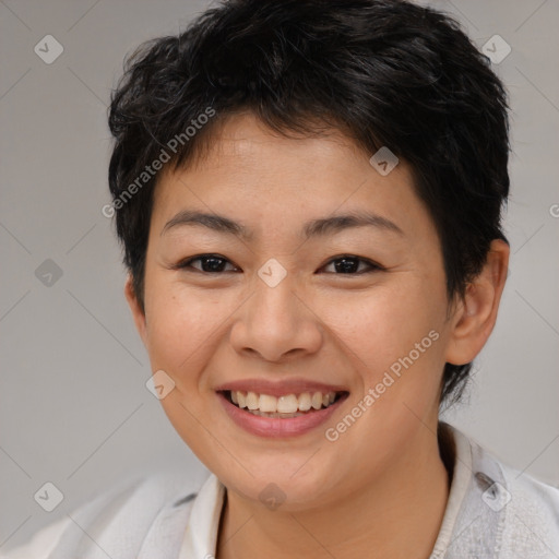 Joyful asian young-adult female with short  brown hair and brown eyes