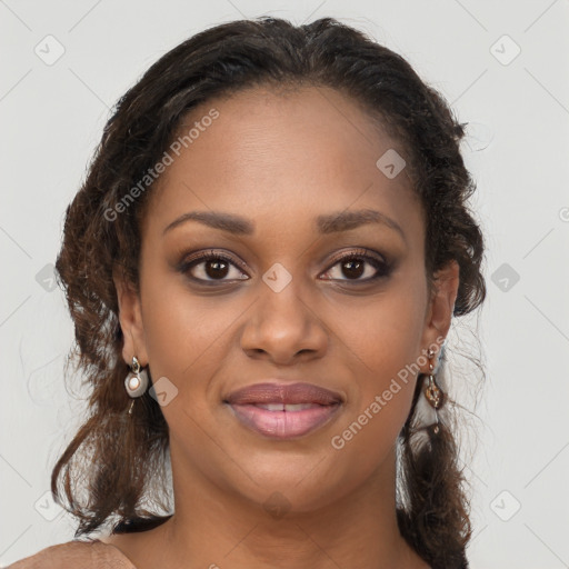 Joyful black young-adult female with long  brown hair and brown eyes