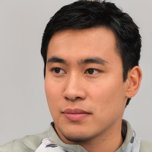 Neutral asian young-adult male with short  black hair and brown eyes