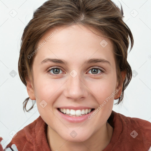 Joyful white young-adult female with medium  brown hair and blue eyes