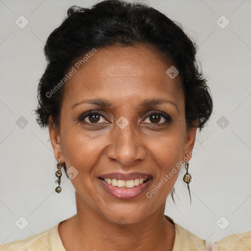Joyful black adult female with short  brown hair and brown eyes