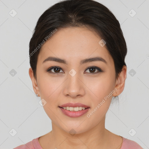 Joyful asian young-adult female with short  brown hair and brown eyes