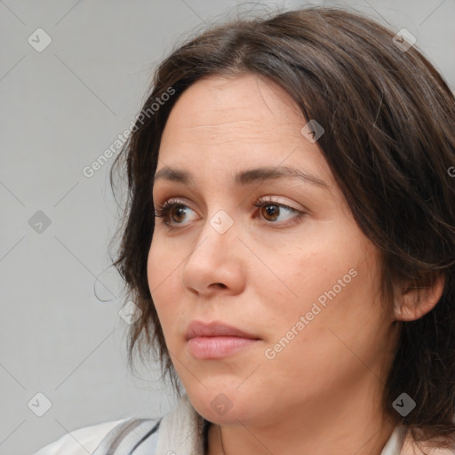 Neutral white young-adult female with medium  brown hair and brown eyes