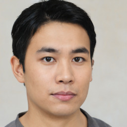 Neutral asian young-adult male with short  black hair and brown eyes