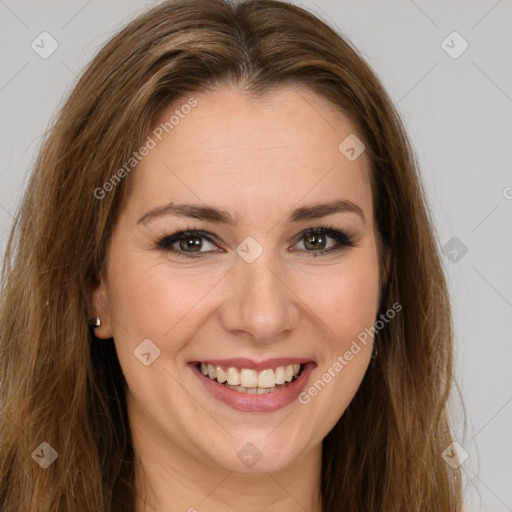 Joyful white young-adult female with long  brown hair and green eyes