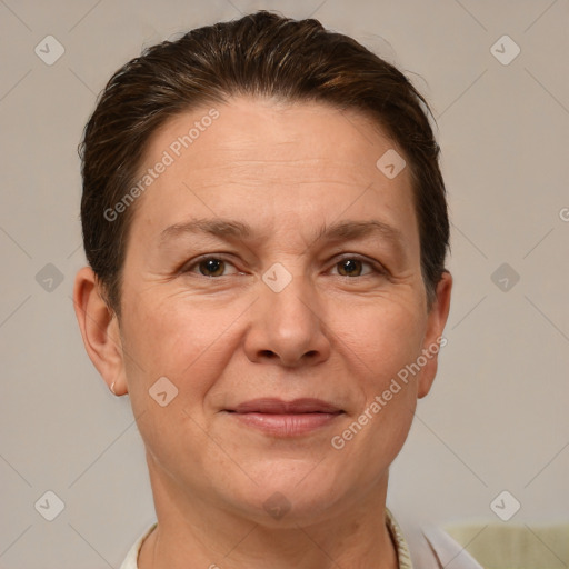 Joyful white adult female with short  brown hair and brown eyes