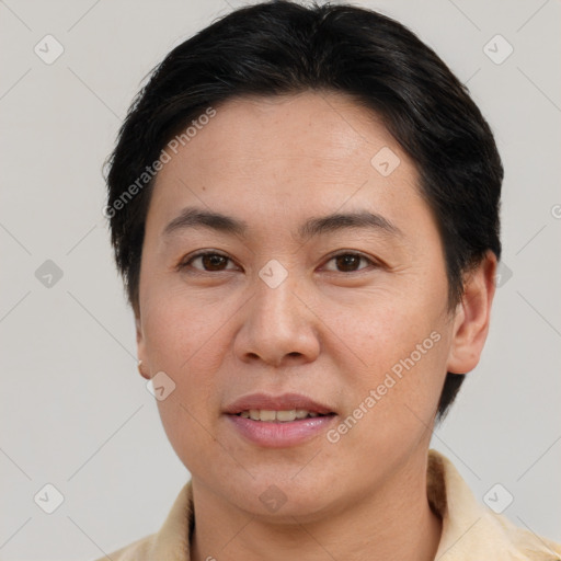 Joyful white adult female with short  brown hair and brown eyes