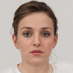 Neutral white young-adult female with short  brown hair and grey eyes