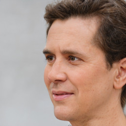 Neutral white adult male with short  brown hair and brown eyes