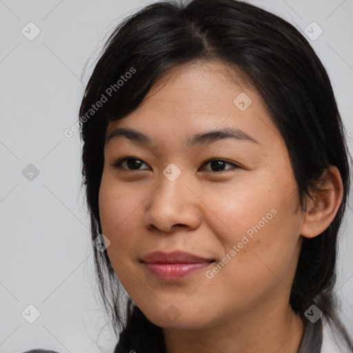 Joyful asian young-adult female with medium  black hair and brown eyes