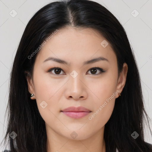 Joyful asian young-adult female with long  brown hair and brown eyes