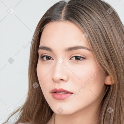 Neutral white young-adult female with long  brown hair and brown eyes