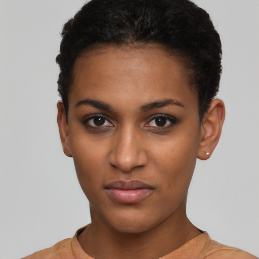 Neutral black young-adult female with short  brown hair and brown eyes