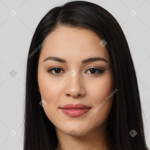 Joyful latino young-adult female with long  black hair and brown eyes