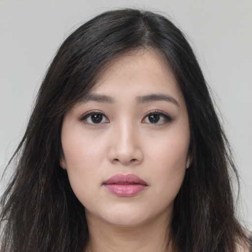 Neutral white young-adult female with long  black hair and brown eyes