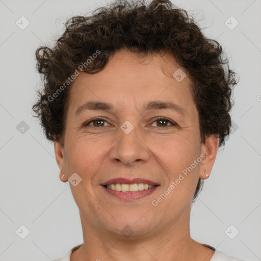 Joyful white adult female with short  brown hair and brown eyes