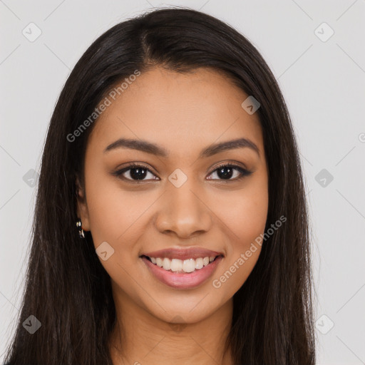 Joyful latino young-adult female with long  brown hair and brown eyes
