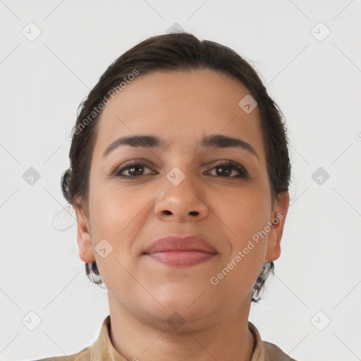 Joyful latino young-adult female with short  brown hair and brown eyes