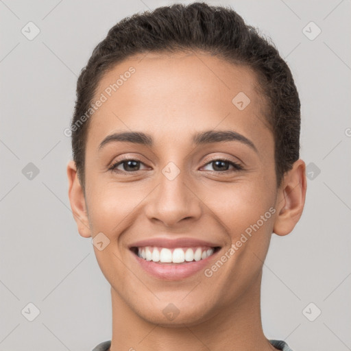 Joyful white young-adult female with short  brown hair and brown eyes