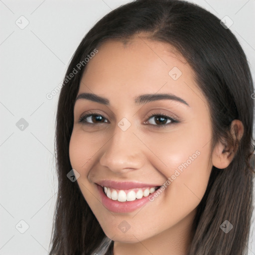 Joyful white young-adult female with long  brown hair and brown eyes