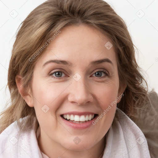 Joyful white young-adult female with long  brown hair and blue eyes