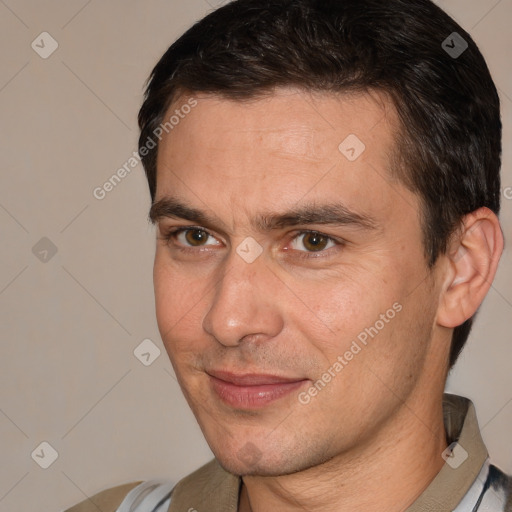 Joyful white adult male with short  brown hair and brown eyes