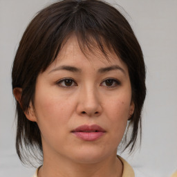 Neutral asian young-adult female with medium  brown hair and brown eyes