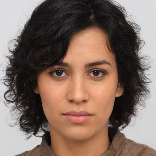 Neutral asian young-adult female with medium  brown hair and brown eyes