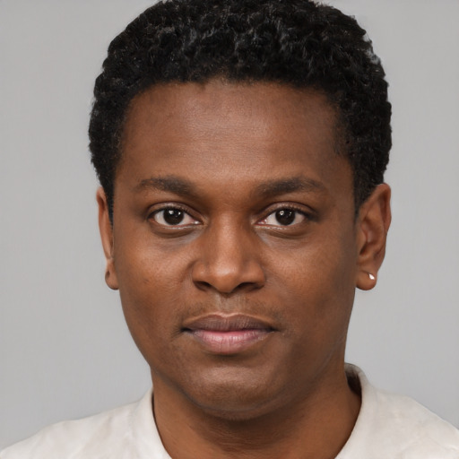 Neutral black young-adult male with short  brown hair and brown eyes